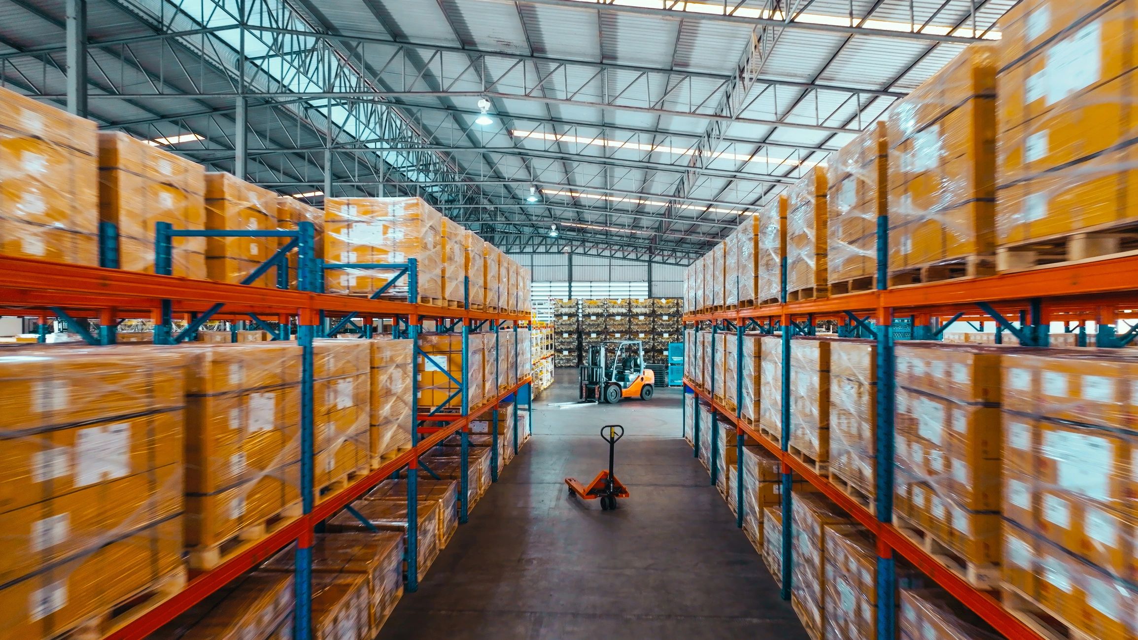 Packages stored in a fulfillment warehouse for outgoing shipment